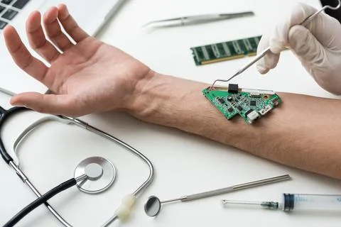 Bionic microchip inside human body - future technology and cybernetics concept. Stock Photos