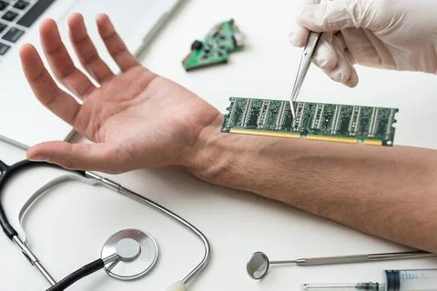 Bionic microchip inside human body - future technology and cybernetics concept. Stock Photos