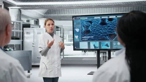 Biotechnology expert in lab presenting innovative DNA sequencing project Stock Footage 326831481