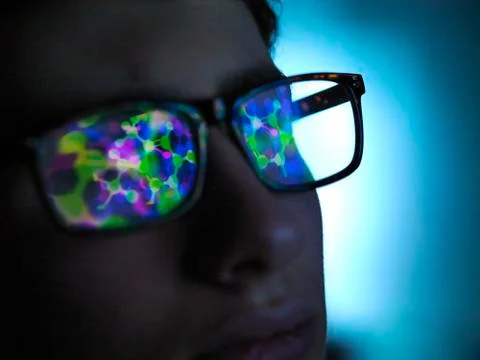 Biotechnology research, computer screen reflection in spectacles of new Stock Photos