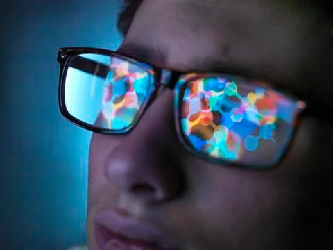 Biotechnology research, computer screen reflection in spectacles of new Stock Photos