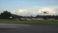 BiPlane Lands On Small Airport Runway 4k or 4k+ Resolution