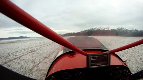 Biplane taking off from landscape Stock-Footage 83183995