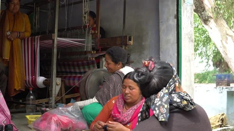 BIR, INDIA - 2020, OCT 18: Women Weaving and Spinning Yarn in Cottage Workshop Stock Footage 208928183
