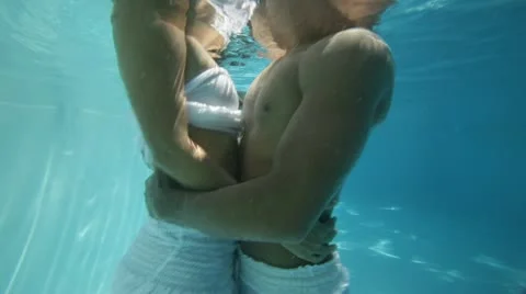 Biracial Couple romancing Under Cater Stock Footage 12921937