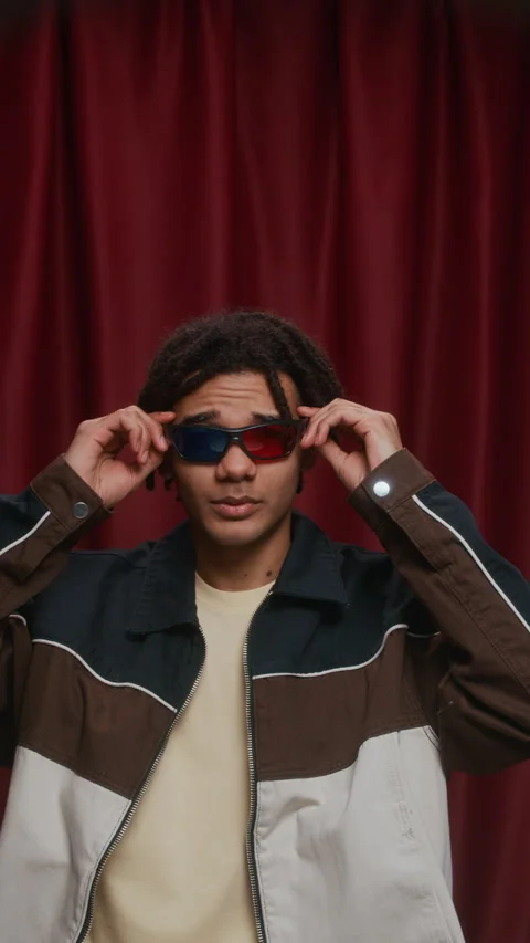 Biracial Guy Wearing 3D Glasses in Photo Booth Stock Footage 310737533
