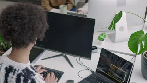 Biracial Male Programmer Coding on Desktop Computer in Office Stock Footage 274339979