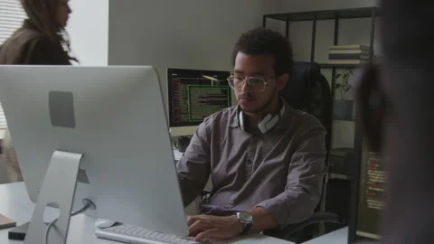Biracial Man Developing Software at Workplace Stock Footage 255781067
