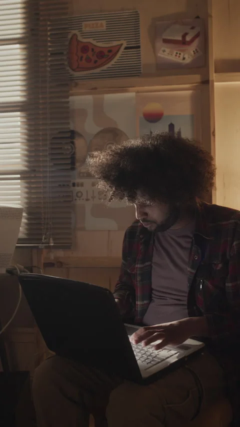 Biracial Programmer Using Laptop in Garage Office Stock Footage 263296547