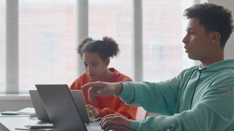 Biracial Schoolboy Using Laptop at Programming Class Stock Footage 248532279
