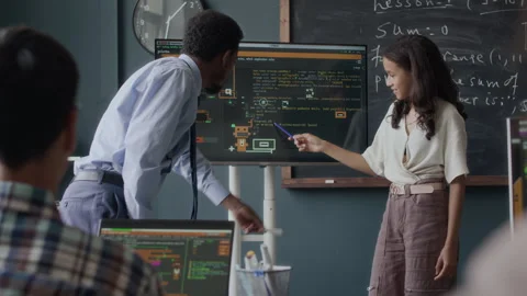 Biracial Student Studying Software Engineering with Teacher in Class Stock Footage 284429283