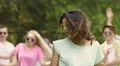 Biracial woman in sunglasses at open-air disco, summer vacation, relaxation HD Footage