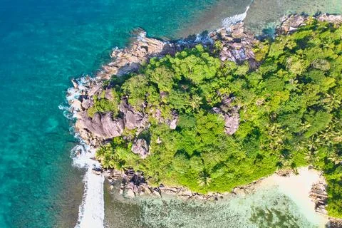 Bird eye drone shot of port glaud beach, Mahe, granite stones, white sandy  Stock Photos