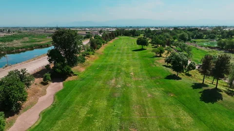 Bird eye shot of Golf course. Establishing shot, drone flying over golf club Stock Footage 250120488