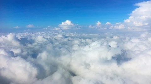 Bird eye view, Cloud over sky look through plane window view flying high Stock Footage 119626407