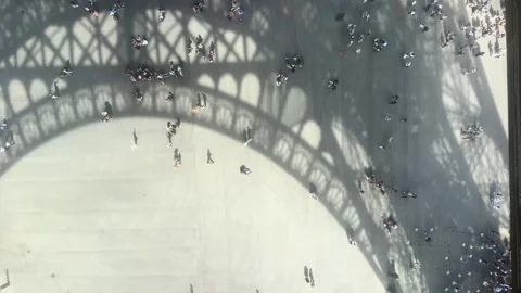 Bird eye view of crowd of people from top view of Eiffel Tower's intricate iron Stock Footage 334119257