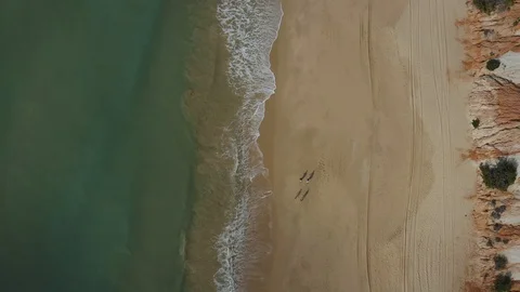 Bird Eye View Of Empty Sandy Beach in Algarve Stock Footage 128834719