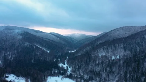 Bird eye View of Mountains Covered with Snow 動画素材 103818174