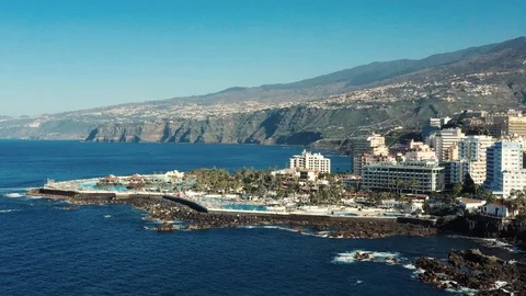 Bird eye view resort on azure ocean coast against mountains Stock Footage 101960185