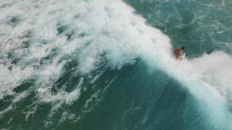 Bird Eye VIew of Surfer in Hawaii Stock Footage 100143199
