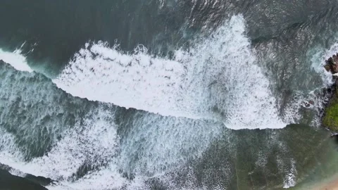 Bird Eye View on Waves &amp; Rock Video stock 147194848