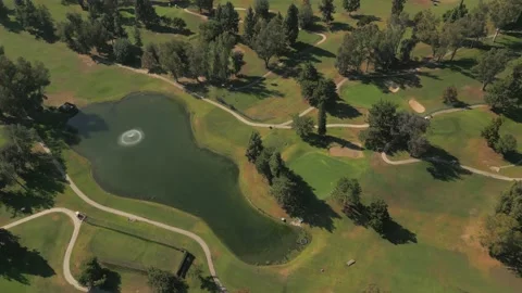 Bird eyes view golf course afternoon Stock Footage 220163701