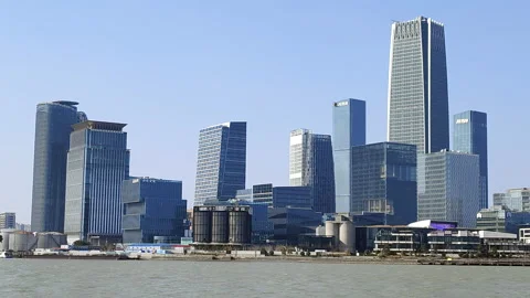 A bird flies over Huangpu River in Shanghai Stock Footage 172132016