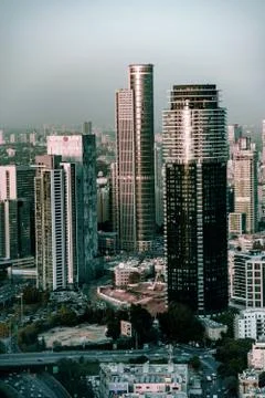 Bird fly view on sunset tel aviv modern city in Israel 스톡 사진