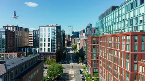 Bird Flying By a Drone Shot in Boson's South End Ink Block Neighborhood Stock Footage 236403032