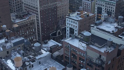 Bird flying through buildungs with a panoramic view over Manhattan Stock Footage 92578464