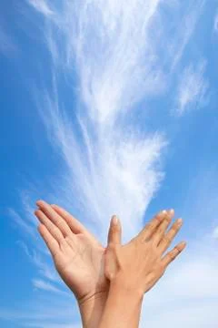 Bird gesture by couple with cloud background Stock Photos