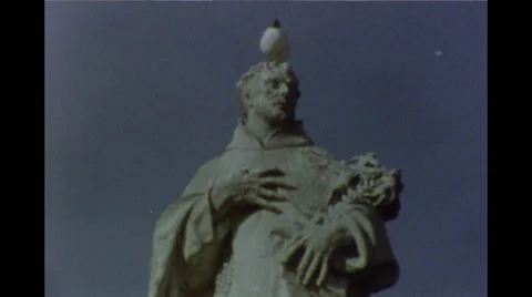 Bird on Statue on Charles Bridge, Prague Super 8 Stock Footage 49976643