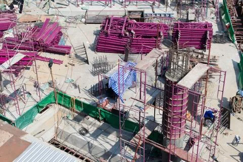 Bird-view construction site, workers work structure with cement  steel and me Stock Photos