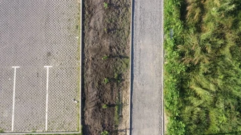Bird view of parking lots and sidewalk boulevard by the river Video stock 277707456