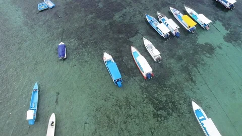Bird view of two men paddling on kayak in turquoise water Stock Footage 102990054