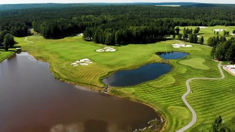 Bird view of World-class golf course and beautiful lake and field at summer, 4K Stockbeeldmateriaal 134811113