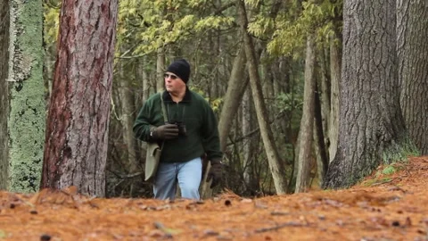 Bird Watcher Hiking in Forest 動画素材 172263709