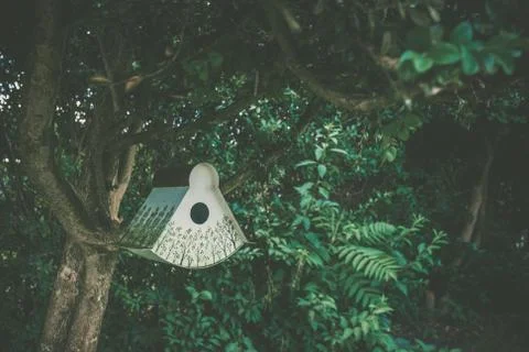 Birdhouse with decorative tree patterns Stock Photos