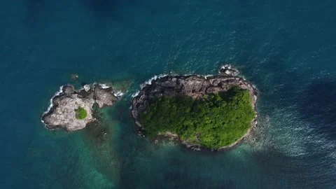 Birds eye aerial view of the small tropical islands . Symmetry Stock Footage 157749074