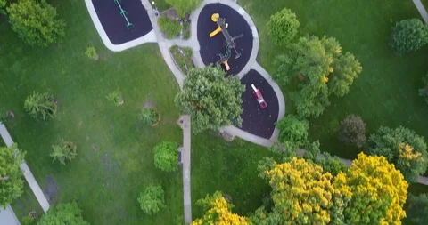 Bird's Eye Drone Flight Over Suburban Park at Sunrise Stock Footage 86023366