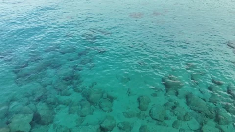 Birds-Eye Drone View of Turquoise Sardinian Waters with Rocks Visible Be Stock Footage 332607131