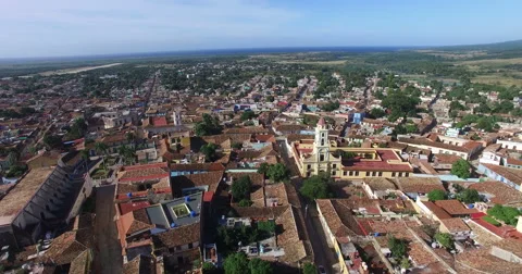 Bird's-eye panoramic view to roofs of ancient houses, main roads, buildings and Stock Footage 68386283