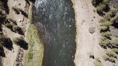 Birds eye of remote high desert flyfishing stream canyon Stock Footage 95874832