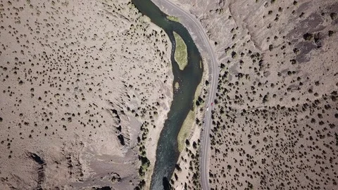 Birds eye of remote high desert flyfishing stream canyon Stock Footage 95877392