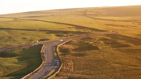Birds eye view above idyllic country roads at sunset Stock Footage 105305143