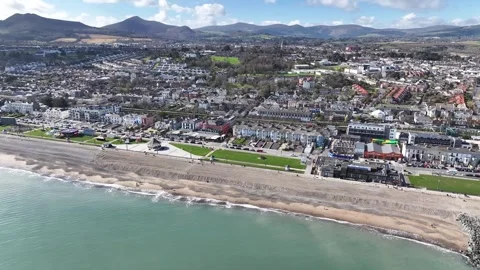 Birds eye view of beach and promenade in Bray coastal town in Ireland. Sunny Stock Footage 332609733