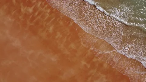 Bird's eye view, beach, red sand, blue ocean Stock Footage 172529580