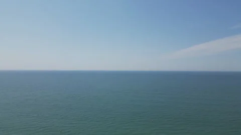 Birds eye view of blue ocean stretching to horizon. Stock Footage 312744222