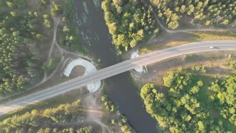 Bird's eye view of the bridge over which cars move Stock Footage 275597552