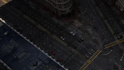 Birds eye view of busy intersection with parked cars during day Stock Footage 343549165